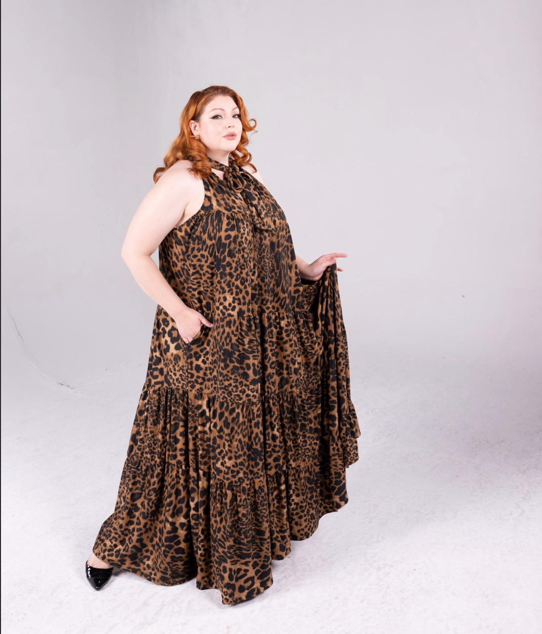 leopard print maxi dress with pockets, and neck tie to secure the top of the dress 